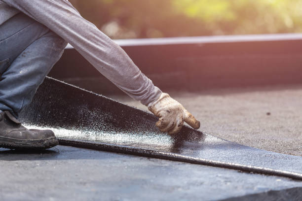 Professional Basement Waterproofing technician working in Orleans, MI